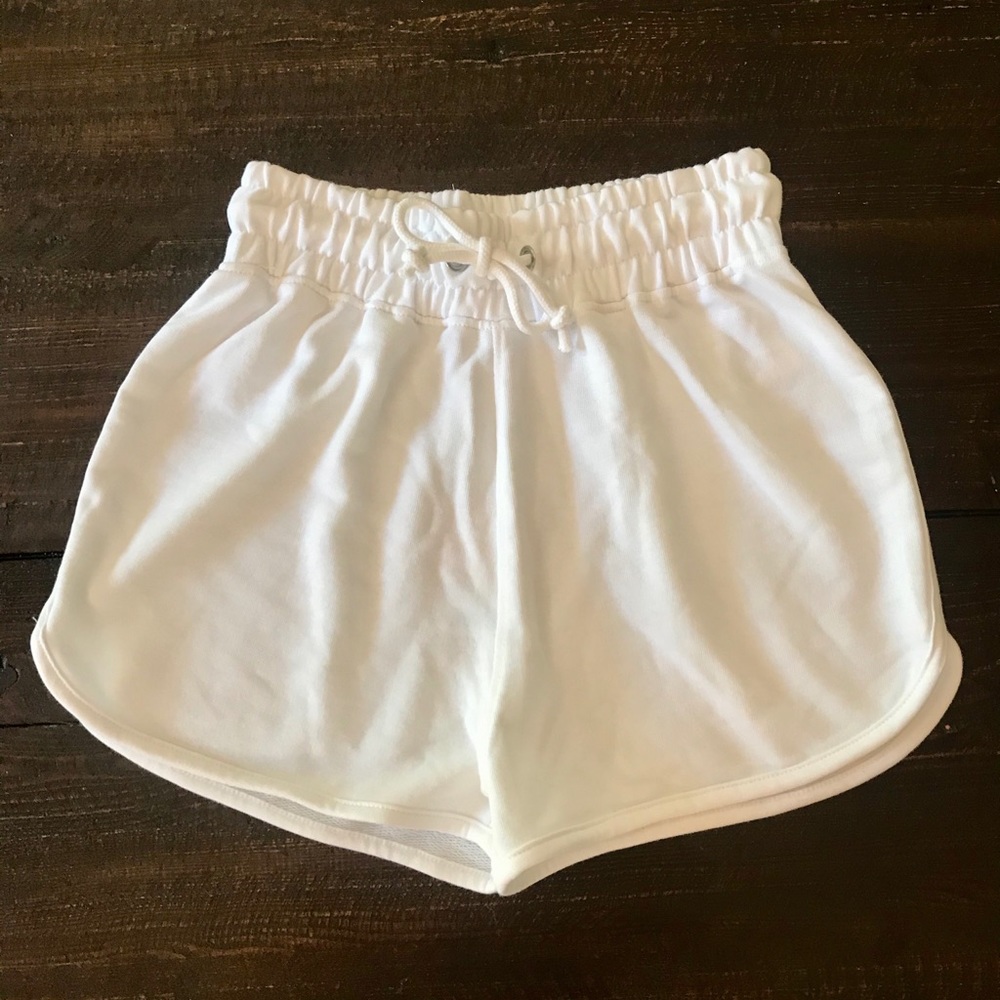 White sweat shorts